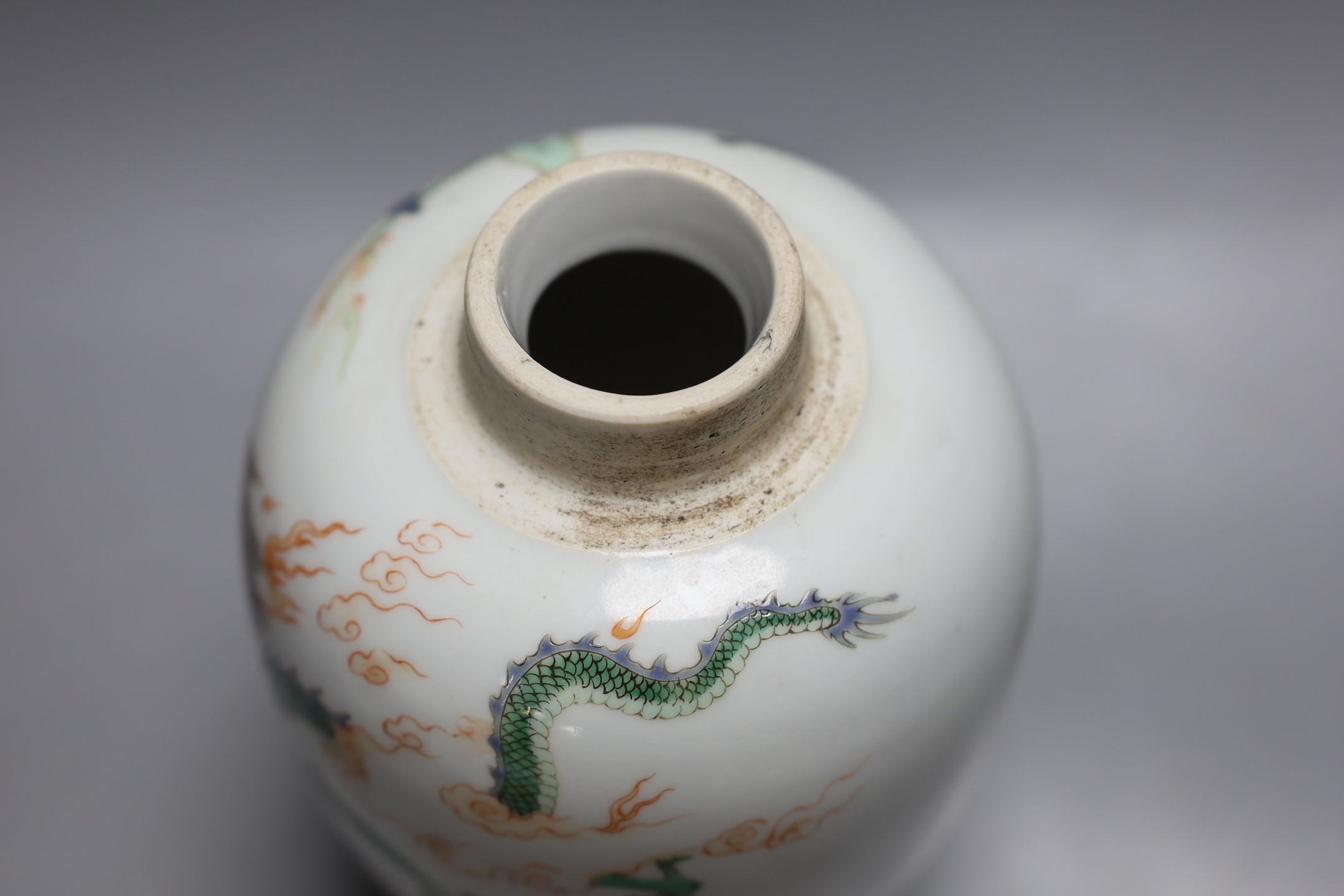 A Chinese famille verte ‘fish and dragon’ jar, lacking cover, 19cm